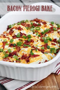 bacon and egg bake in a white casserole dish on a wooden table