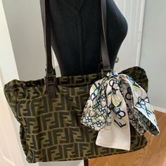 Authentic, Preowned Fendi Bag Tote Or Shoulder Bag. Soft Material In Very Nice, Clean And Very Good Condition Overall. Comes With Fendi Dustbag, Twilly, And Woth Generic Black Organizer Inside The Bag. Dimensions 13”W X 9”L X 4”D Fendi Tote, Fendi Bag, Twilly, Fendi Bags, Soft Material, Gym Bag, Dust Bag, Fendi, Overalls