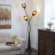 a living room scene with focus on the floor lamp