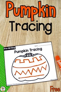 a pumpkin traceing activity for kids on a wooden table