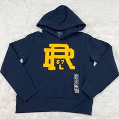 84% Cotton 16% Polyester Pocket Front Navy Hooded Top For Fall, Navy Hoodie For Fall, Blue Hoodie With Drawstring Hood, Blue Fleece Tops With Letter Print, Navy Long Sleeve Hoodie With Letter Print, Navy Hooded Top With Letter Print, Sporty Navy Hoodie Top, Blue Long Sleeve Top With Drawstring Hood, Blue Fleece Tops With Logo Print