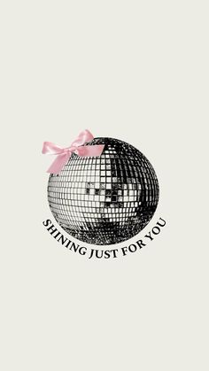 a disco ball with a pink ribbon around it and the words sing just for you