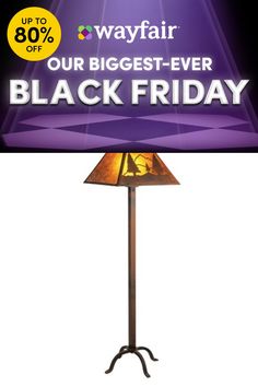 a lamp that is on top of a stand with the words wayfair our biggest - ever black friday