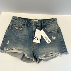 Zara Brand New Distressed Jean Shorts. Light Wash Distressed. Zip Fly, Button Enclosure. 12” Outseam. 2 1/2” Inseam. Zara Casual Shorts With Button Closure, Casual Zara Shorts With Button Closure, Zara Summer Jeans With Button Closure, Zara Jeans With Button Closure For Summer, Ripped Cotton Bottoms By Zara, Zara High Rise Distressed Bottoms, Zara High Waist Distressed Bottoms, Zara Ripped Cotton Bottoms, Zara Distressed Mid-rise Bottoms