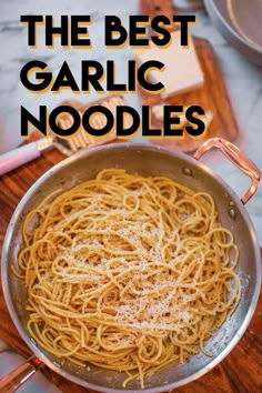 the best garlic noodles in a pan with text overlay