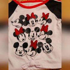 So Cute With Minnie And Mickey Faces Covering The Front And A Minnie Bow At The Bottom. Solid White Back With Red Trim At Round Neckline. Sleeves Are Long With Black And Red Trim Down Middle From Shoulder To Cuff. Cotton Minnie Mouse Top For Playtime, Casual Minnie Mouse Tops For Playtime, Cute Minnie Mouse Long Sleeve T-shirt, Casual Mickey Mouse Tops For Playtime, Cute Minnie Mouse Cotton Top, Cotton Mickey Mouse Top For Playtime, Cute Long Sleeve Minnie Mouse T-shirt, Playful Mickey Mouse Tops For Playtime, Fun Cotton Minnie Mouse Top