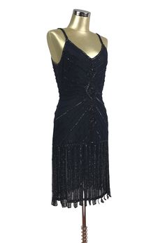 Our Millicent Gown is the perfect dress for your Art Deco event! Constructed on evening quality poly georgette, the gown features a classic Deco motif on the bodice and a streaming carwash hem on the skirt. Adjustable straps for the perfect fit. Matching georgette scarf included (68" x 21"). Fully lined. Small....Bust 34", waist 29", hips up to 36", length 39" Medium....Bust 36", waist 31", hips up to 38", length 39" Large....Bust 38", waist 33", hips up to 40", length 39" XL....Bust 40", waist Art Deco Event, Modern Flapper Dress, 1920s Looks, Gatsby Headband, 20s Flapper, Mesh Gown, Silk Lingerie, Hip Ups, Beaded Gown