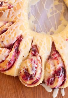 a bundt cake with cranberry sauce and icing