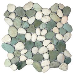 a white and green mosaic tile with rocks on it