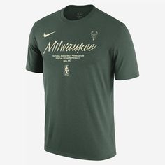 An essential piece of gear for any Milwaukee Bucks fan. Show your love for your squad in this soft, classic-fit Milwaukee Bucks tee. Nike T-shirt With Team Logo For Fan Merchandise, Nike Tri-blend Sports T-shirt, Nike Pre-shrunk Fan Apparel T-shirt, Nike T-shirt With Letter Print For Fan Merchandise, Nike Moisture-wicking Fan Apparel T-shirt, Nike Moisture-wicking T-shirt For Fans, Nike Sports Fan T-shirt For Fan Merchandise, Nike Crew Neck T-shirt For Fan Merchandise, Green Team Logo T-shirt Fan Gear