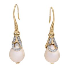 This is an authentic pair of JOHN HARDY 18K Yellow Gold Diamond Bamboo Pearl Drop Earrings. The earrings are crafted of 18 karat yellow gold and feature teardrop-shaped freshwater cultured pearls suspended from a diamond-encrusted setting, approximately .13 total carat weight. Luxury Teardrop Pearl Earrings With Diamond Accents, High Luster Teardrop Pearl Earrings, Yellow Gold Drop Bridal Earrings For Formal Occasions, Formal Yellow Gold Drop Bridal Earrings, Yellow Gold Briolette Pearl Earrings For Formal Occasions, Yellow Gold Briolette Teardrop Earrings For Formal Events, Yellow Gold Briolette Teardrop Earrings For Formal Occasions, Luxury Teardrop Pearl Pendant Earrings, Yellow Gold Teardrop Briolette Earrings For Formal Occasions