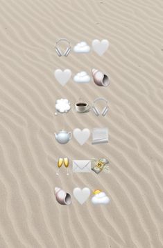 the sand is covered with hearts and other things to be seen on it's surface