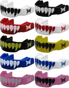 several different colored bracelets with heart shaped teeth