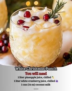 a white christmas punch with pineapple juice and cranberries