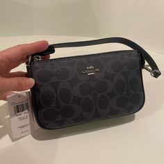 Brand New With Tag. Color: Midnight Navy Measurements: 7 1/2” (L) X 4 1/2” (H) X 2”)W) Gray Crossbody Evening Bag, Gray Crossbody Shoulder Bag For Evening, Gray Evening Bag With Detachable Strap, Evening Bag With Detachable Strap In Gray, Gray Crossbody Bag For Evening, Gray Evening Shoulder Bag With Removable Pouch, Gray Evening Bag With Silver-tone Hardware, Luxury Gray Bag With Zipper Closure, Gray Evening Shoulder Bag With Detachable Strap