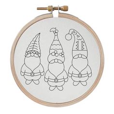 three gnomes with hats on their heads are shown in this embroidery pattern