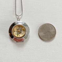 Silver Metal Pocket Watch With Compass Design, Metal Pocket Watch With Compass Design As Gift, Stainless Steel Locket Pendant Necklace, Vintage Stainless Steel Jewelry With Compass Design, Nickel-free Silver Stainless Steel Locket Necklace, Travel Silver Stainless Steel Jewelry, Travel Stainless Steel Silver Necklaces, Silver Pendant Jewelry For Travel, Stainless Steel Locket Necklace