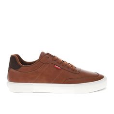 Classic, crisp, and comfortable – these retro-inspired, lowtop sneakers are built to always have your best foot forward. Whether you're meeting the fam for lunch or heading in for a casual day at the office, these men’s sneakers are designed to seamlessly complement any look, from jeans to slacks. The bold rubber outsole adds traction and support while keeping your look polished and crisp. The synthetic leather materials, detailed stitching, and Levi’s iconic red tab logo elevate any outfit with Retro Brown Lace-up Skate Shoes, Vintage Leather Skate Shoes With Contrast Sole, Brown Lace-up Casual Skate Shoes, Casual Brown Lace-up Skate Shoes, Levi's Low-top Sneakers With Rubber Sole, Levi's Low-top Sneakers For Streetwear, Brown Casual Skate Shoes With Vulcanized Sole, Casual Brown Skate Shoes With Vulcanized Sole, Brown Leather Sneakers For Fall