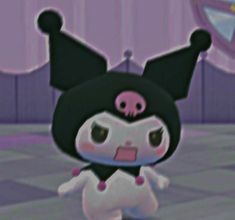 an animal crossing game character in black and white outfit with pink nose, ears and tail