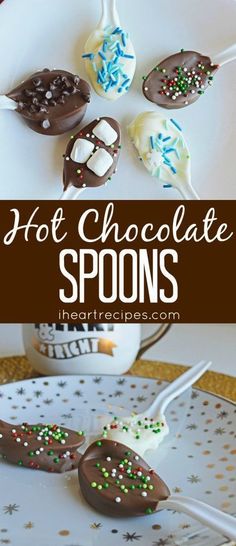 hot chocolate spoons with sprinkles on them are sitting on a plate