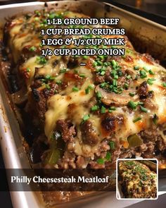 a casserole dish with meat, cheese and green onions