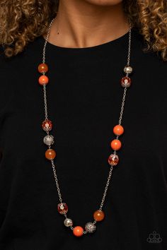 Infused with shiny silver beads and silver ornaments, a collection of glassy, polished, and crystal-like Amberglow beads drape across the chest for a colorful collision. Features an adjustable clasp closure.

 Sold as one individual necklace. Includes one pair of matching earrings. Silver Strand, Hanging Necklaces, Orange Necklace, Silver Ornaments, Purple Pearl, Teardrop Beads, Paparazzi Accessories, Blue Gems, Jewelry Business