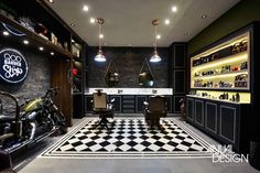 a black and white checkered floor in a barber shop with two motorcycles parked on the side