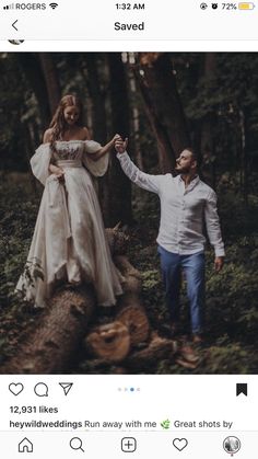 a man and woman are walking through the woods