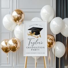 a graduation party welcome sign with balloons and streamers in the background for an elegant celebration