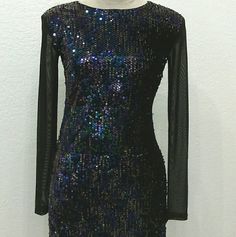 New With Tag. Sheer See-Through Back And Sleeves. Side Zipper. Lined. Stretchy Material. Sequins Are Purple, Green, And Gold. Length 32". Purple Green, Forever 21 Dresses, 21 Dresses, Sequin Dress, Stretchy Material, Green And Gold, Side Zipper, Colorful Dresses, Forever 21