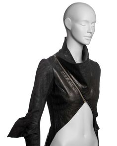 For Sale on 1stDibs - ▪ Brand: Rick Owens ▪ Creative Director: Rick Owens ▪ Collection: Fall-Winter 2009 ▪ Fabric: Black Leather ▪ Details: The jacket features a cropped silhouette Cropped Winter Outerwear For Night Out, Cropped Outerwear For Night Out In Winter, Chic Fitted Biker Jacket For Evening, Modern Fitted Outerwear With Asymmetrical Zip, Modern Fitted Leather Jacket With Long Sleeves, Elegant Fitted Biker Jacket With Zip Fly, Avant-garde Fitted Spring Outerwear, Fitted Biker Jacket For Fall Evenings, Fitted Biker Jacket For Evening In Fall