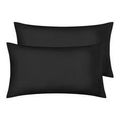 two black pillow cases sitting next to each other