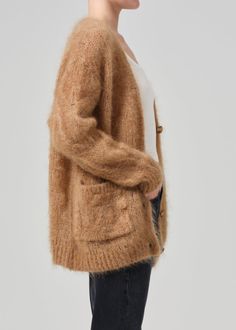 Crafted from an ultra-fine wool, the Padma Cardigan is designed with a slightly-sheer open weave and oversized fit. Given the delicate nature of the fibers, there may be some minor shedding that occurs. This fit is true to size. Looks Like: Golden brown knit cardiganFeels Like: Mohair blend cardigan that is soft to the touch Matching Separates, Cable Cardigan, Fashion Institute, Jumpsuit Jacket, Autumn Dress, Mohair Wool, Warm Autumn, Open Weave, Citizens Of Humanity