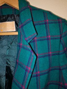 Vintage 1990's  Pendleton 100% wool blazer Made in the USA 90' blue and fusia colors Size 10 Length= 25" shoulder seamto bottom Chest" 17" across pit to pit Arm length = 21" shoulder seam to end of cuff Chest measures 17" across tapers down to 16" then flares back out to 17" at the bottom. Green button closure 6" from the bottom Mermaid Books, Elephant Parade, Cape Style, Pendleton Wool, Green Button, Bamboo Handles, Wool Plaid, Wool Blazer, Green Jacket