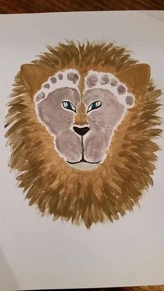 a drawing of a lion's head on a piece of paper