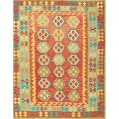 an orange and green rug with geometric designs on the front, in various colors and shapes