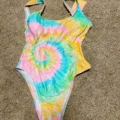 Adorable Tie-Dye Swimsuit Size Extra Small Car 0 To 2 Casual Multicolor Bodysuit For Beach Season, Summer Yellow Bodysuit For Pool, Yellow Bodysuit For Pool In Summer, Yellow Bodysuit For Pool And Beach Season, Summer Yellow One-piece Bodysuit, Yellow Bodysuit For Summer Pool, Yellow One-piece Bodysuit For Summer, Yellow Sleeveless Bodysuit For Pool, Casual Multicolor Bodysuit For Summer