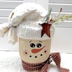 a mug with a snowman face on it