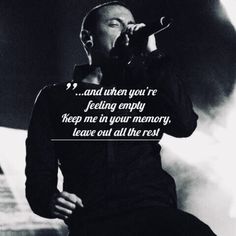 a woman singing into a microphone with the words, and then you're feeling empty keep me in your memory leave out all the rest