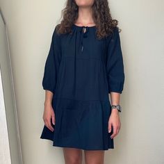 Navy Blue Long Sleeve Tiered Babydoll Dress From J. Crew. Size Small. Flowy, Boxy Fit. Deep V-Neck. Ties At The Neck With Tassel Detailing. 3/4 Length Sleeves. Brand New, With Tags, Originally $98 Casual Blue Tiered Dress, Blue Cotton Tiered Dress For The Beach, Blue Cotton Tiered Beach Dress, Blue Cotton Tiered Dress For Beach, Blue Mini-length Tiered Dress For Brunch, Blue Mini Length Tiered Dress For Brunch, Blue Casual Flowy Tiered Dress, Casual Blue Flowy Tiered Dress, Casual Blue Tiered Dress With Loose Fit