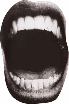 an open mouth with white teeth and no teeth is shown in this black and white photo