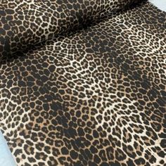 an animal print fabric is shown on the ground