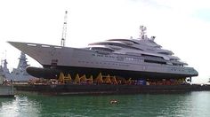 a large boat is docked in the water