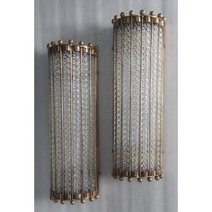 pair of wall sconces with crystal glass panels