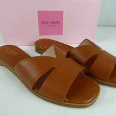 Kate Spade Sandals ”Dock” Flats In Slip On Style Leather Upper Leather Lining Padded Insole Barely There, Less Than 1/2” Heel Kate Spade Branding Leather Outsole ”Hot Cider” Color Brand New In Box Pricing Is Fair And Quite Firm . Please Let Us Know If You Have Any Questions. Brown Slides With Branded Insole, Brown Leather-lined Slides For Spring, Kate Spade Leather Open Toe Sandals, Brown Almond Toe Sandals For Beach, Kate Spade Leather Beach Sandals, Kate Spade Leather Sandals For Beach, Kate Spade Leather Sandals For Vacation, Kate Spade Leather Sandals For Summer, Kate Spade Casual Leather Sandals