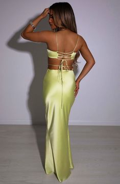 Going out? Enter Valeria. your new favourite maxi skirt made from luxury stretch satin with a bias cut which drapes beautifully around your curves. The design is finished with a slightly dipped waist.  Colour: Lime.  Premium stretch satin.  Fully lined in satin.  Bias cut which hugs the figure.  Slight dipped waist.  Maxi length Model is a Size XS & is wearing an XS. She is 160cm Tall and wears a size C Breast Cup. Ruffled Gown, Long Sleeve Homecoming Dresses, Split Long Dress, Homecoming Dresses Long, Maxi Dress Sale, Sparkle Dress, Lace Evening Dresses, Tulle Prom Dress, Waist Strap