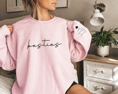 Custom Besties Sweatshirt Friend Name on Sleeve, Besties Hoodie, Best Friend Sweatshirt, BFF Gift, Personalized Besties Sweatshirt ❤Welcome to Capellaa Designs,  If you are looking for clothes that suit your pleasure, you are in the right place! I would really like to offer you the best products. I love my job and are happy to offer you quality products. If you have any questions, concerns or requests regarding my products, feel free to ask me. This is my job and you can be sure that we will get back to you as soon as possible. ❤Sizing and Coloring When choosing the product, please pay attention to the size and color. In this way, I can deliver it to you in a shorter time. ❤Product Details Unisex Sweatshirts: - Gildan Brand -50% cotton ❤Shipping  After placing your order, you can be sure t Bestie Sweatshirts, Products I Love, Friends Sweatshirt, I Love My Job, Bff Gift, Bff Gifts, I Love You All, Love My Job, My Job