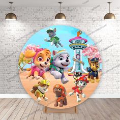 the paw patrol wall mural is in an empty room