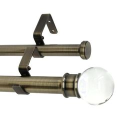 two metal curtain rods with one light on each side