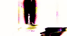 a blurry image of a person standing in front of a mirror